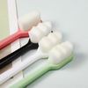 a close up of a tooth brush on a table
