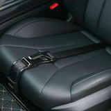 a close up of a black leather seat