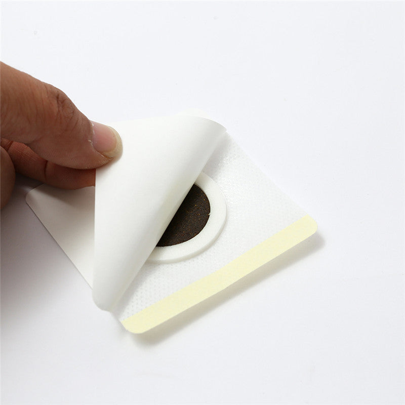 a person is holding a pair of scissors