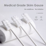 a close up of a towel with a toothbrush in it