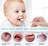 a baby with a toothbrush in her mouth