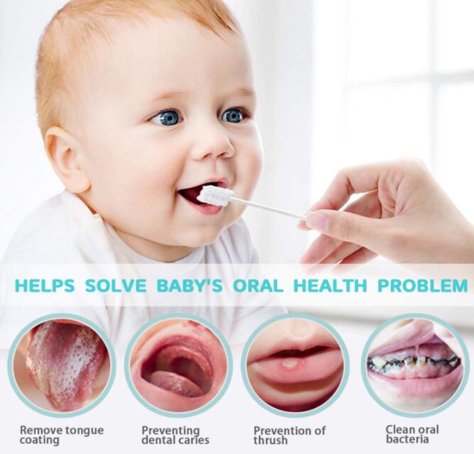 a baby with a toothbrush in her mouth