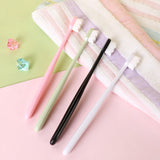 a pair of scissors sitting on top of a bed