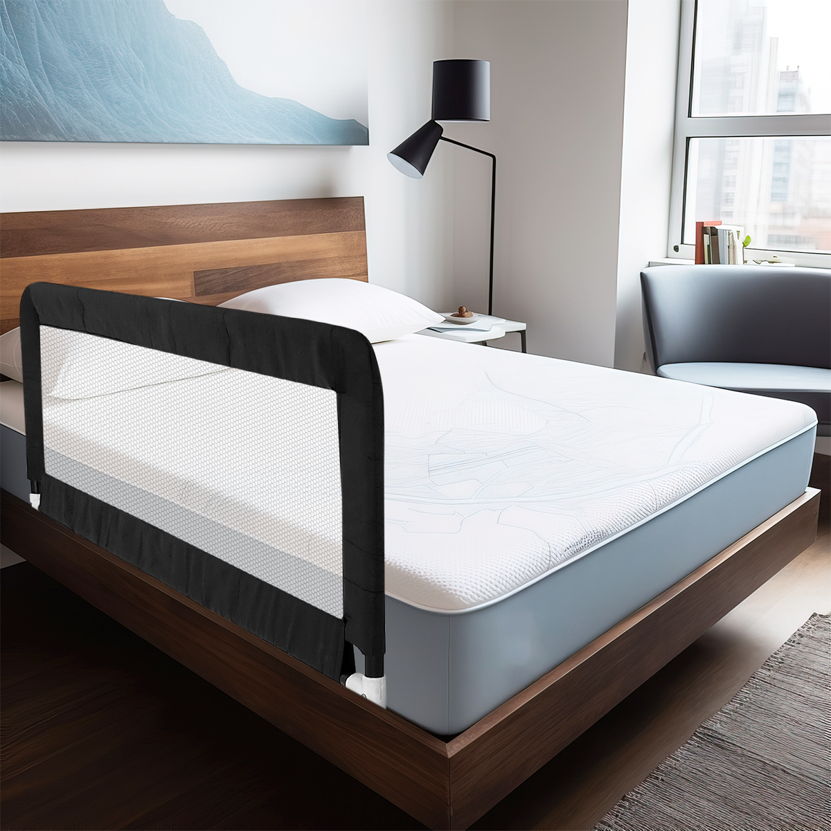a white bed with a white comforter and pillows