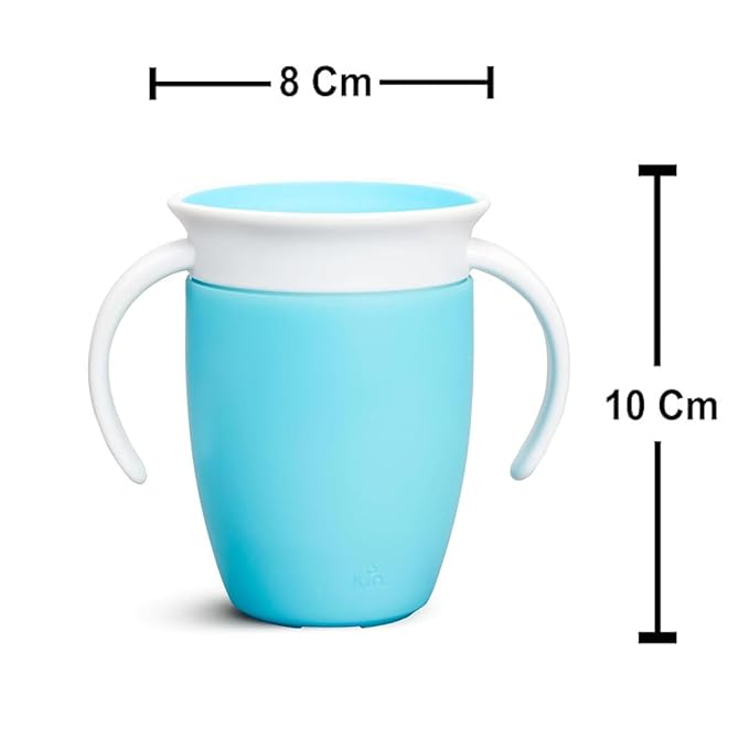 a blue cup sitting on top of a table