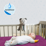 a person laying on a bed with a stuffed animal 